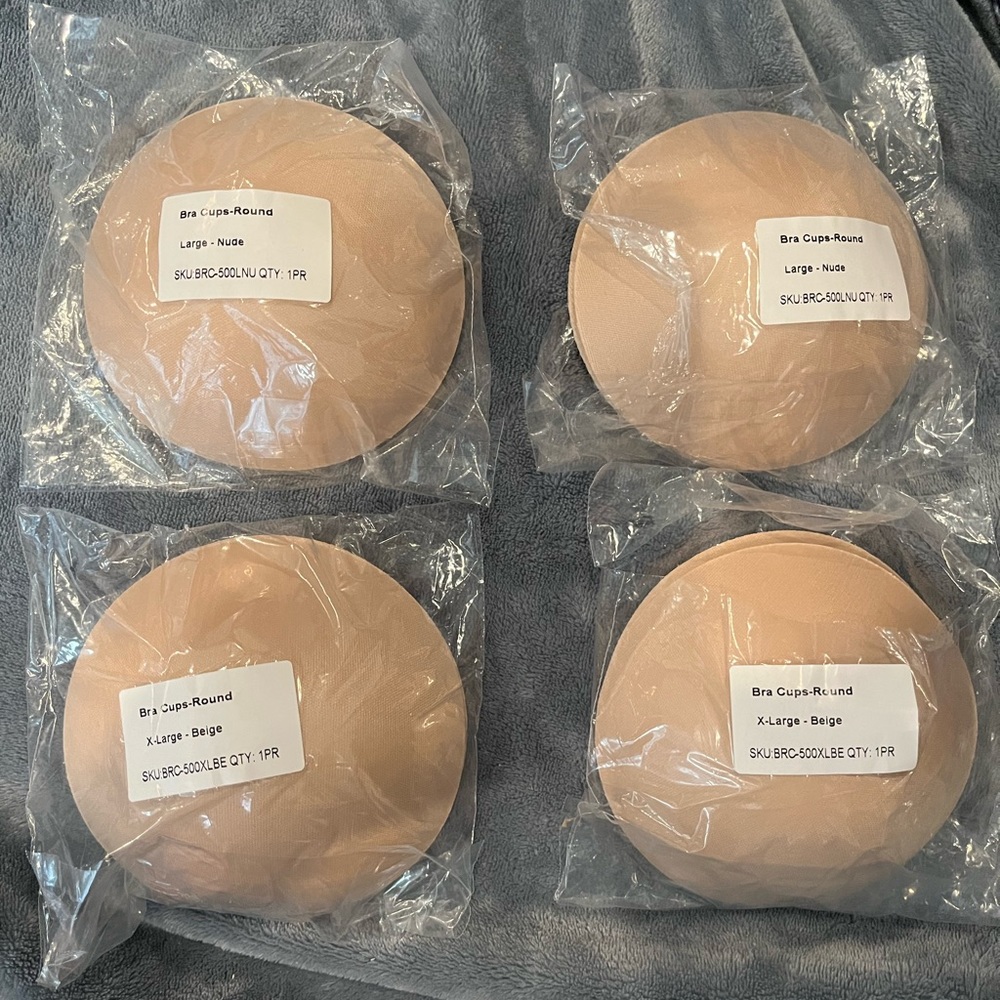 Non serged round bra pads/inserts two sets of L and two sets of XL